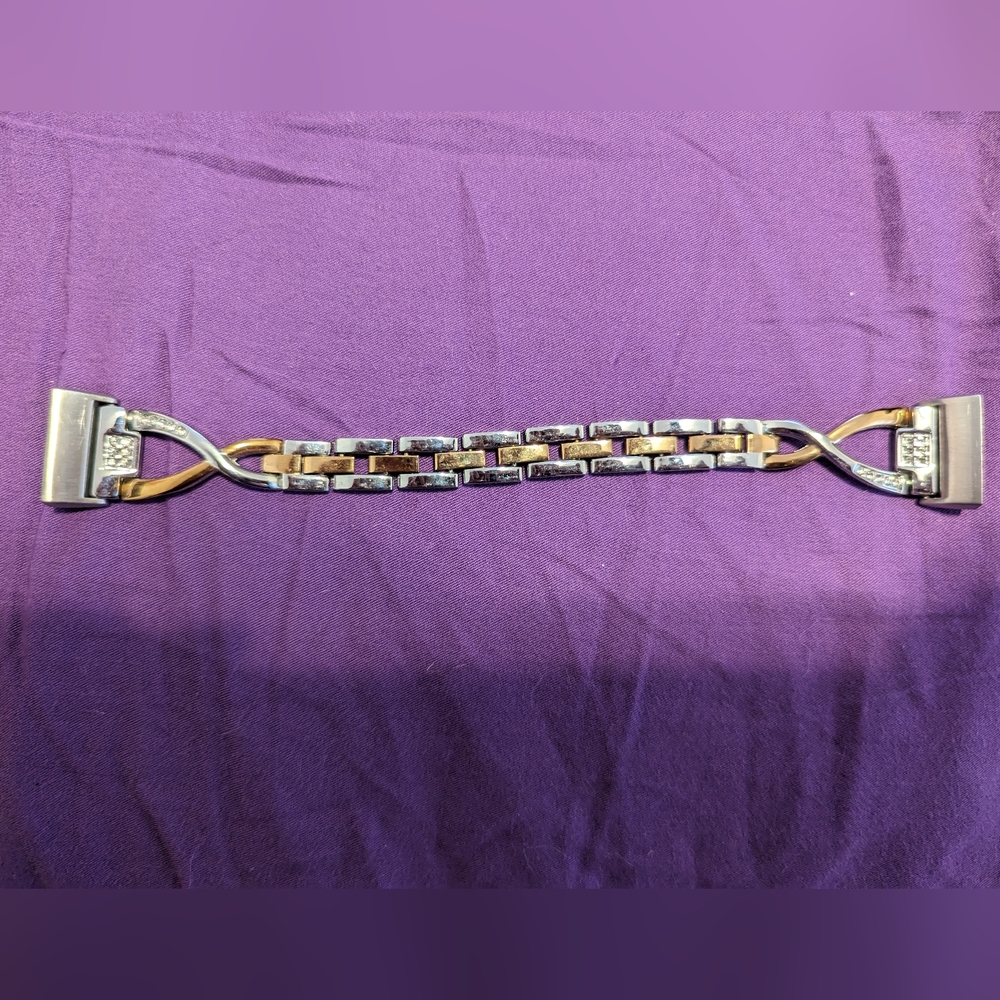 Rose gold and silver Fitbit charger 4 band